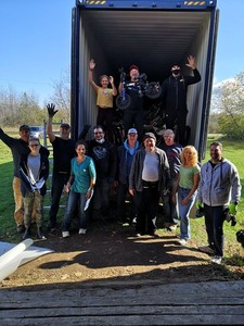 <b>Volunteers celebrate a full trailer-load of bikes going to Cuba.</b><br />Volunteers celebrate a full trailer-load of bikes going to Cuba.